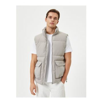 Vesta bufanta cu buzunare laterale