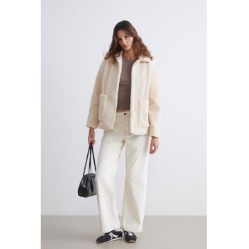 Haina scurta din teddy cu capse