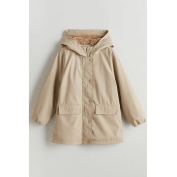 Pelerina de ploaie cu gluga si buzunare